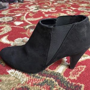 Black ankle boots with heel. Never worn